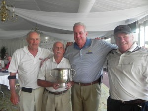 Peterik's Bombers proudly hoist the coveted Conservancy Cup