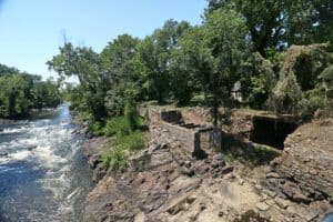 View of stone ruins of Pooles Mill next to the falls of the Appomattox River.
